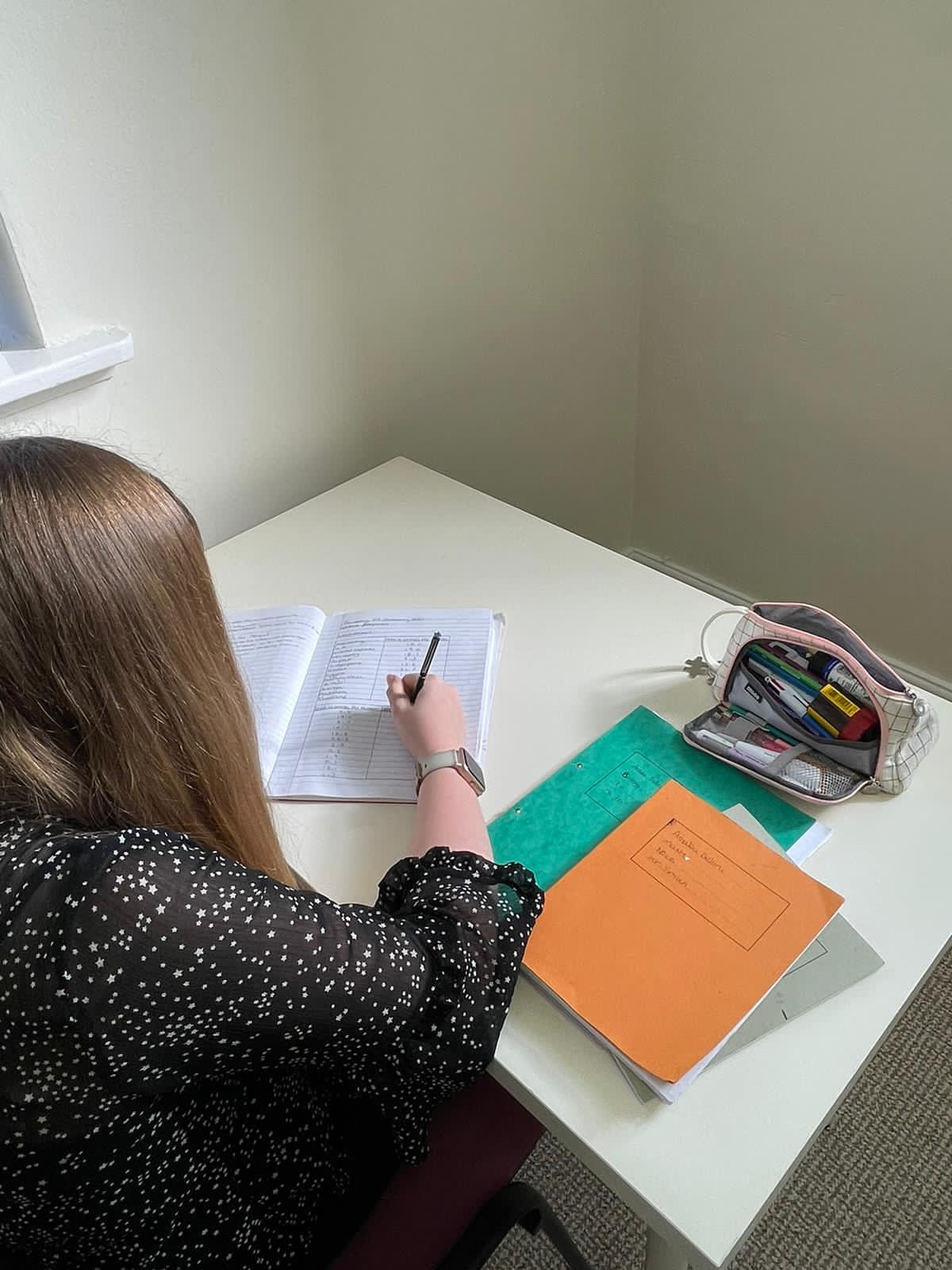 A young person taking part in an educational assessment